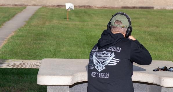 Military veteran shooting at a gun range